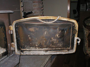 Rope falling off a stove door Rope falling off a stove door