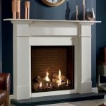 Claremont Limestone Mantel with Slip Set and Honed granite Hearth and Riva 2 750HL Edge Gas Fire with Brick Linings.