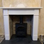 Stovax Stockton Stove in an Inglenook with Limestone Mantel