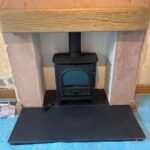 After - Inglenook with Stovax Stockton 5 Wood-burning Stove, Honed Granite Hearths and Light Oak Timber Effect Beam